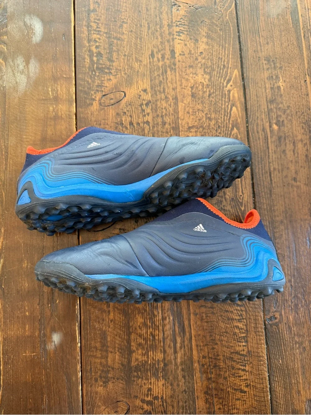 COPA adidas Navy Athletic Soccer Shoes with Orange Trim